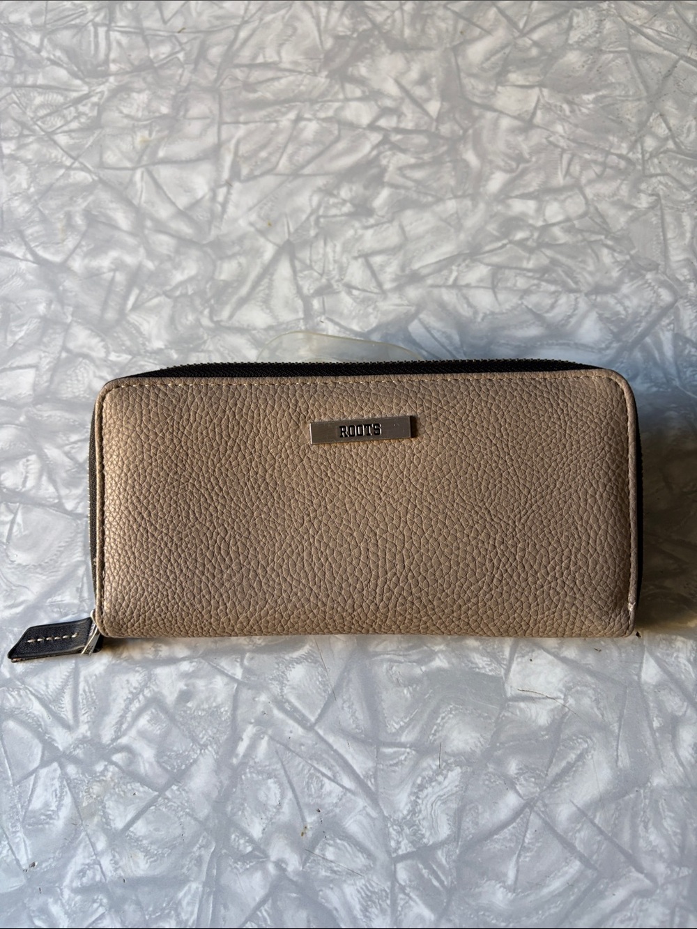 Roots Taupe Pebbled Zip-Around Wallet